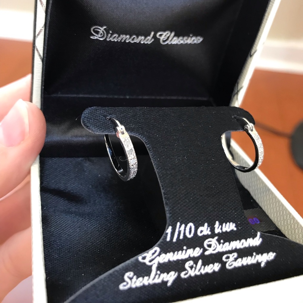 1/10th carat diamond earrings.